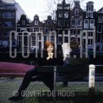 29-03-2001 Chazia Mourali on location in Amsterdam.

[keywords]Posed, Full Length, Eyecontact, Smiling, Bench, Canal, Houses[/keywords]